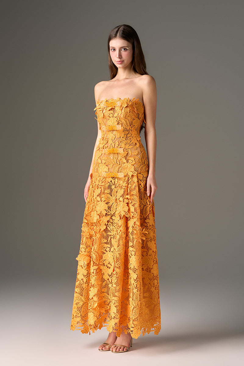 Orange floral strapless maxi dress from CULT MIA X I.H.F Studio, featuring an A-line silhouette and elegant garden-inspired pattern.