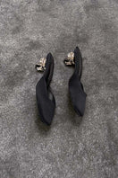 Black Orbit heels by Yassmin Saleh, side view showing sleek design and stylish heel for elegant footwear.