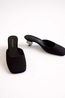 YASSMIN SALEH Orbit heels in brown with sleek design, pointed toe, and stylish ankle strap on a white background.
