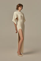 Ivory POEM Maxi Dress displayed on a model, featuring a flowing silhouette and elegant design.