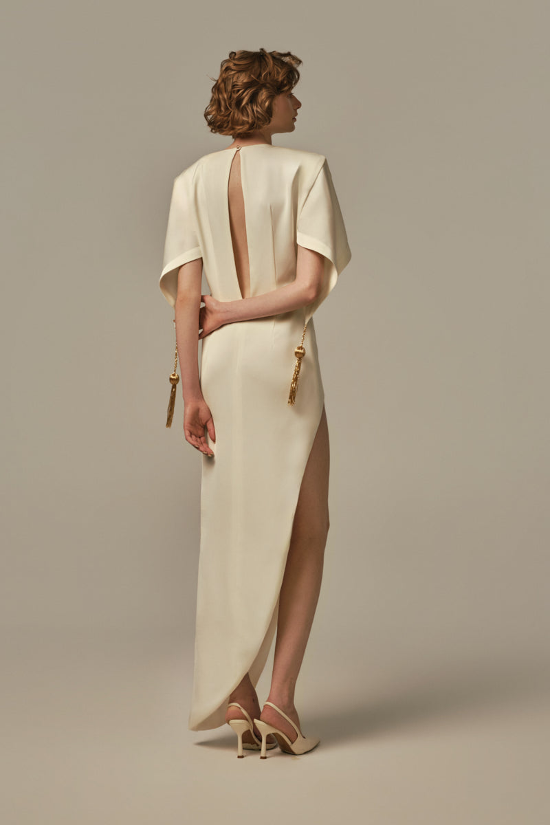 Ivory POEM Maxi Dress with a flowing silhouette, displayed on a model, showcasing elegant, lightweight fabric and stylish design.