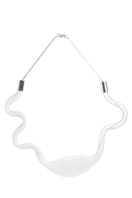 Organic glass necklace by MAZ Manuela Álvarez featuring a sleek, transparent glass pendant on a delicate chain.