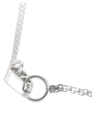 Organic glass necklace from MAZ Manuela Álvarez featuring a sleek, transparent design with a modern, minimalist style.