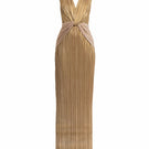 Gold shimmer Oro maxi dress by Maylé Vásquez featuring ombre design, flowing fabric, and elegant floor-length style.