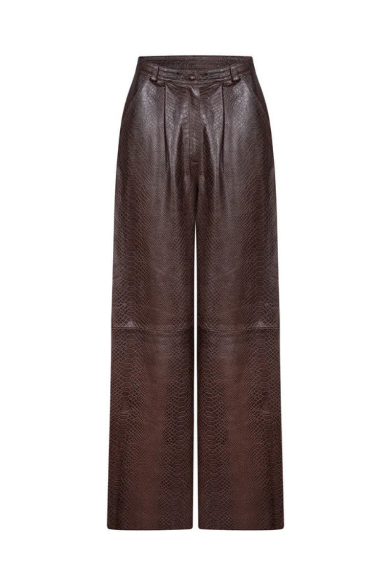 ZUT oversized chocolate crocodile-patterned pants showing relaxed fit and textured fabric in a stylish fashion style