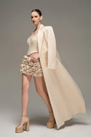 Beige double-breasted long coat by I.H.F Studio, featuring an oversized straight-cut design and classic style.