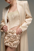Beige corset top and embroidered skirt co-ord set from I.H.F Studio, featuring a stylish oversized long straight-cut coat.