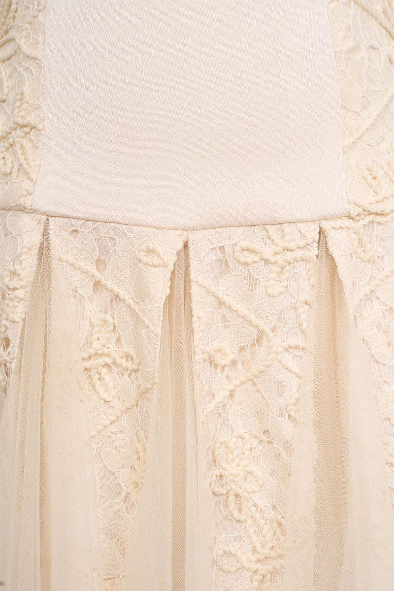 Elegant ELIRA gown by EEGEN STUDIO featuring flowing fabric and intricate design, perfect for formal occasions.