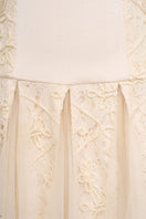 Elegant ELIRA gown by EEGEN STUDIO featuring flowing fabric and intricate design, perfect for formal occasions.