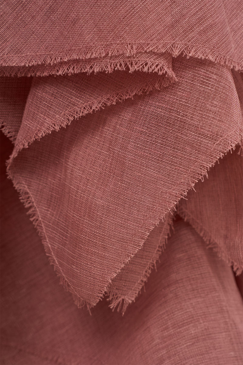 Elegant Dune gown by EEGEN STUDIO in soft fabric, shown with flowing silhouette and detailed neckline.