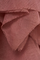 Elegant Dune gown by EEGEN STUDIO in soft fabric, shown with flowing silhouette and detailed neckline.