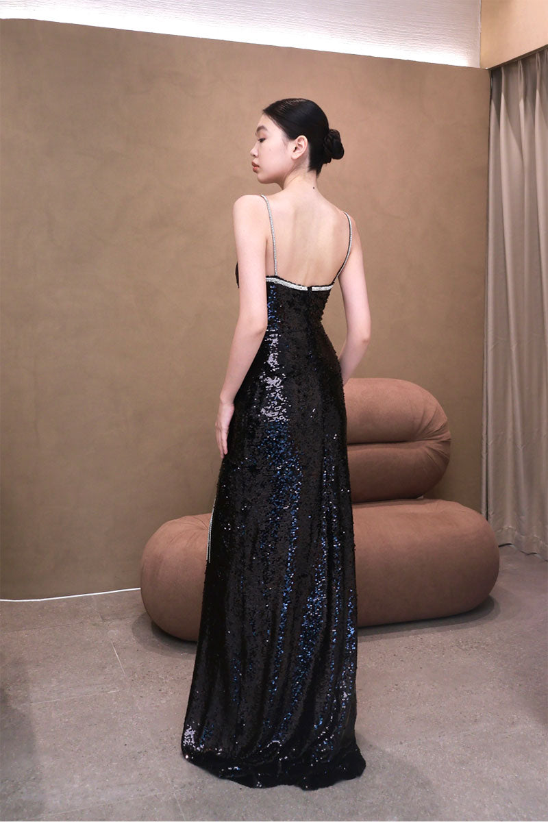 Elegant AZMIRA gown by EEGEN STUDIO, featuring flowing fabric and intricate details, perfect for formal occasions.