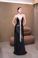 Elegant AZMIRA dress gown by EEGEN STUDIO, featuring flowing fabric and intricate design details in a stylish evening gown.