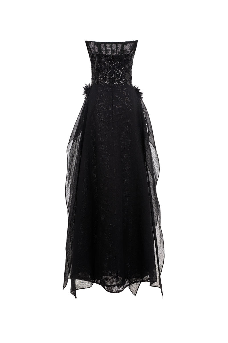 Elegant VESARA gown by EEGEN STUDIO featuring flowing fabric and intricate design, displayed on a mannequin.