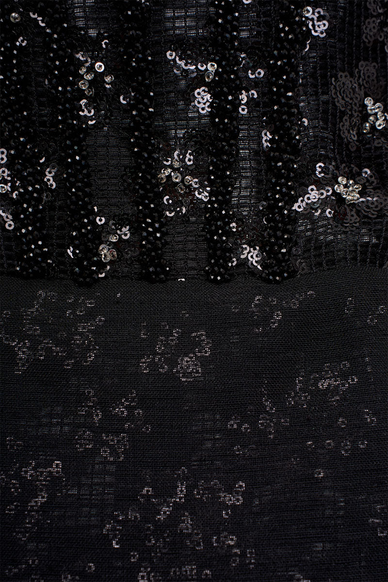 Elegant VESARA gown by EEGEN STUDIO featuring flowing fabric and intricate design, perfect for formal occasions.
