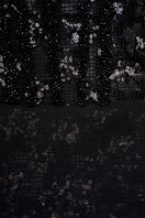 Elegant VESARA gown by EEGEN STUDIO featuring flowing fabric and intricate design, perfect for formal occasions.