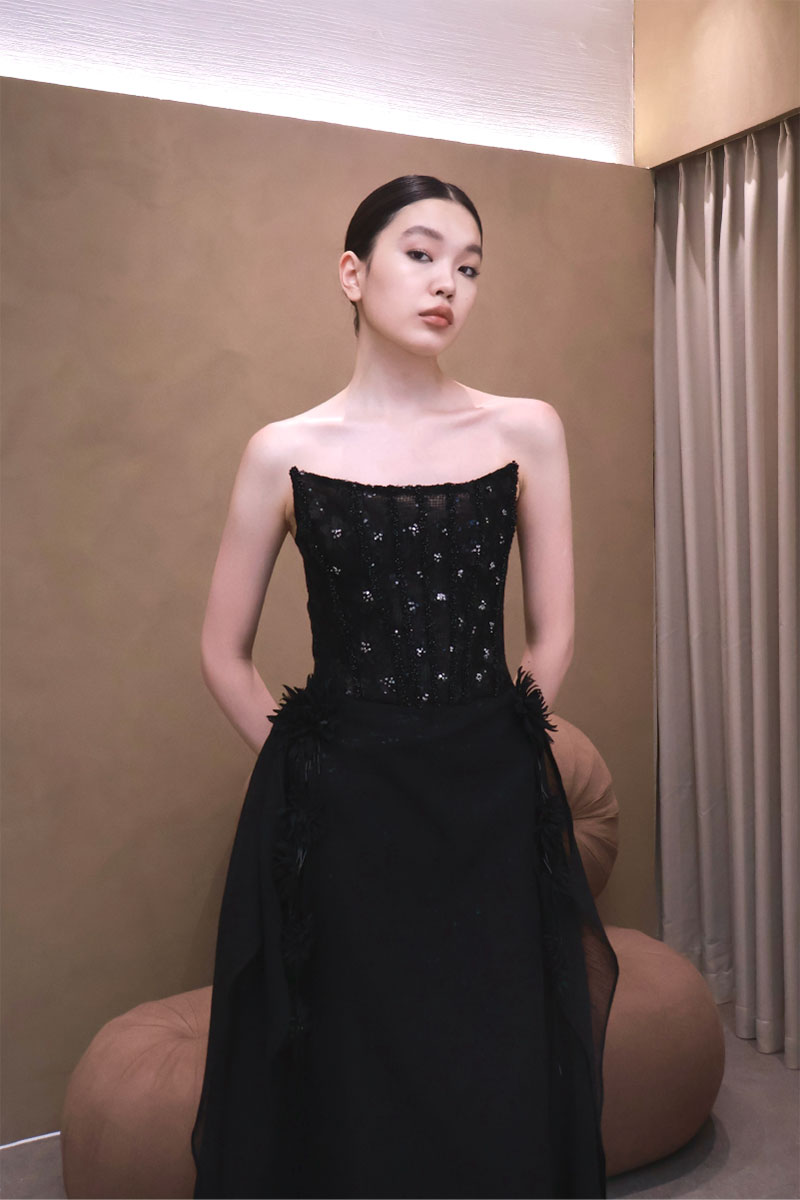Elegant VESARA gown by EEGEN STUDIO, featuring flowing fabric and intricate design, showcased in this image.