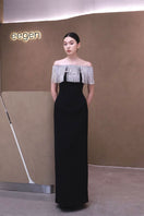 Elegant Kaya dress gown by Eegen Studio, featuring a flowing design and intricate details, shown in a stylish front view.