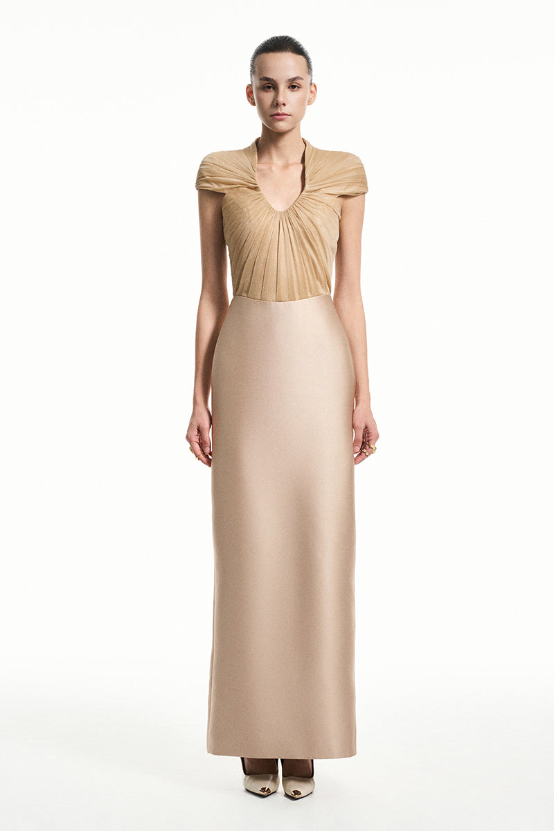 Beige sheer chiffon spandex midi dress by EEGEN STUDIO, featuring a flowing gold-toned maxi dress with elegant draping.