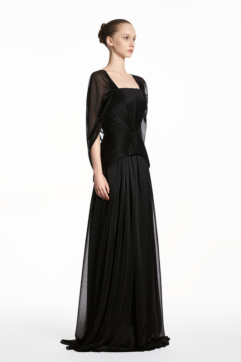 Black EEGEN STUDIO spandex sheer chiffon maxi dress with flowing fabric and elegant design, shown on a model.