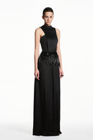 Black taffeta silk gown by EEGEN STUDIO, featuring elegant draping and a sophisticated silhouette.