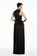 Black Taffeta silk gown by EEGEN STUDIO featuring a flowing design and elegant silhouette.