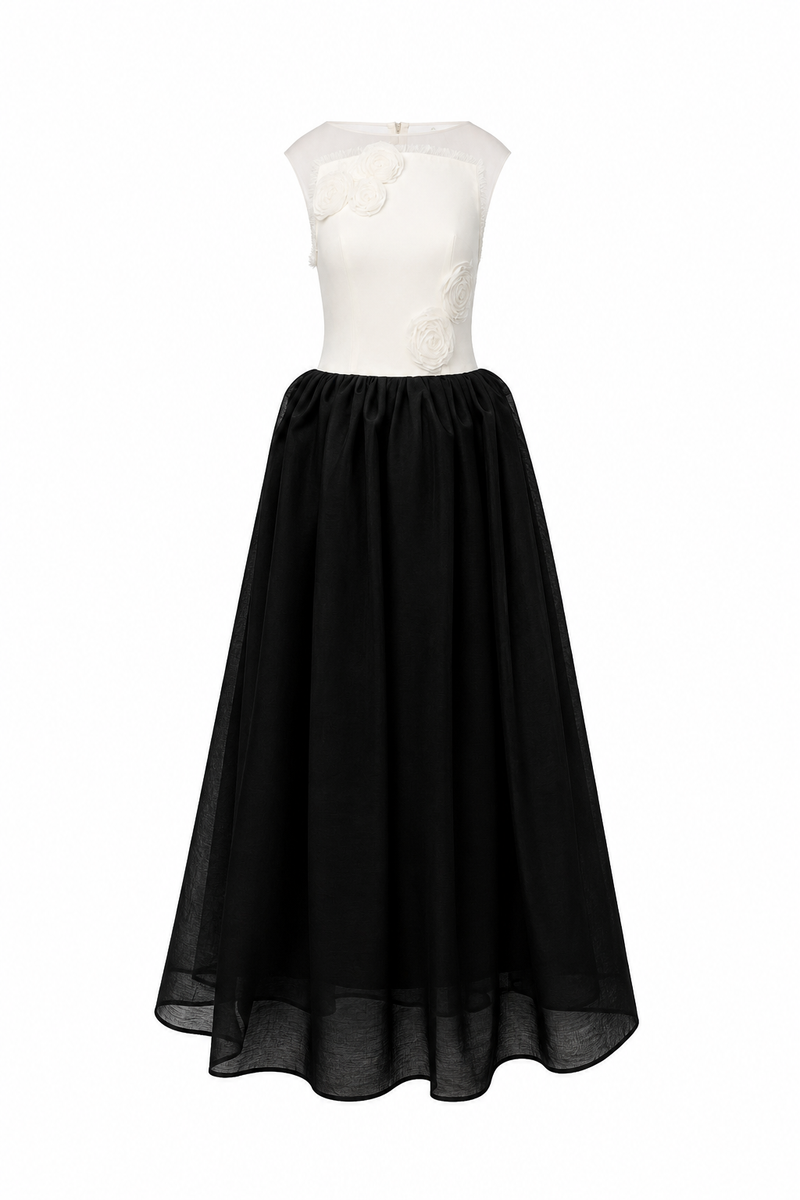 Elegant LINNEA gown by EEGEN STUDIO, featuring flowing fabric and intricate details, perfect for formal occasions.