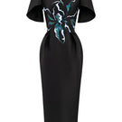 Hand-painted black Luminous Secret midi dress by Tiny Ink, featuring elegant design and flowing fabric for stylish occasions.
