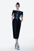 Hand-painted black Luminous Secret midi dress by Tiny Ink, showcasing intricate design and elegant midi length.