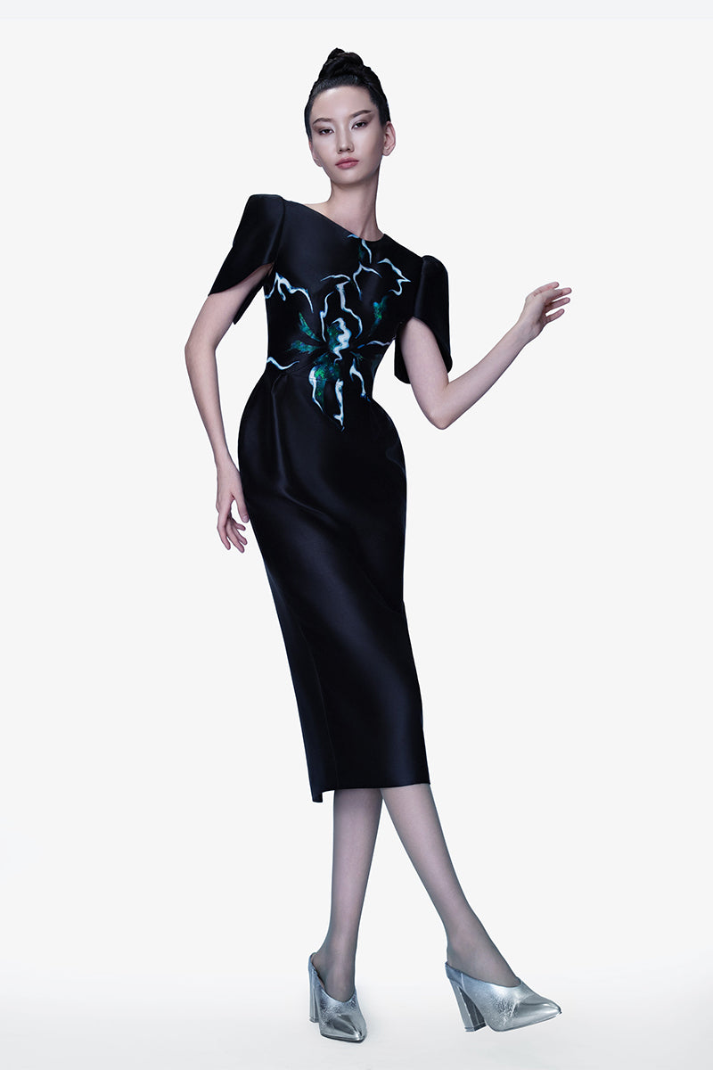 Hand-painted black Luminous Secret midi dress by Tiny Ink, featuring intricate design and elegant midi length.