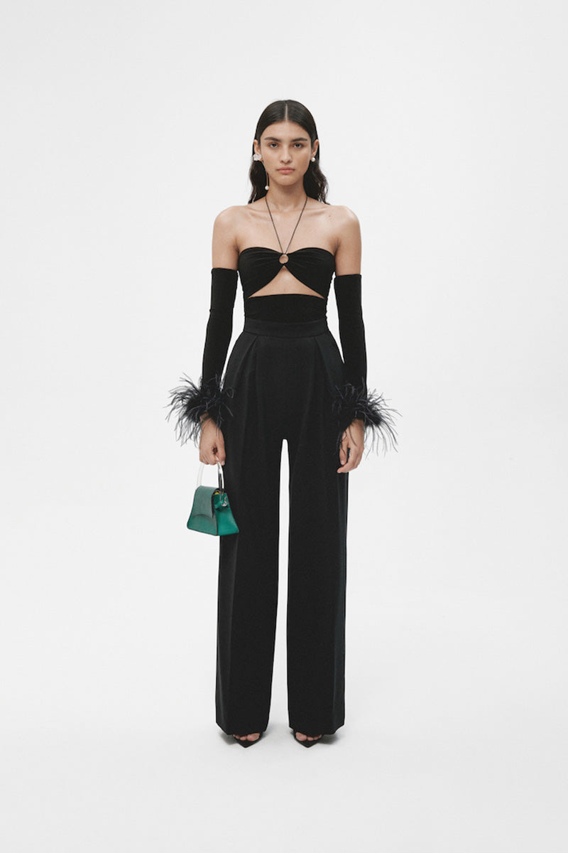 Black cut out top with interchangeable sleeves by JC Pajares, featuring stylish design and versatile sleeve options.