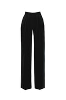 Black JC Pajares double crepe wide leg pants laid flat, showcasing the relaxed fit and smooth fabric texture.