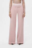 Pink JC Pajares double waistband pants with relaxed fit, shown on a model against a plain background.