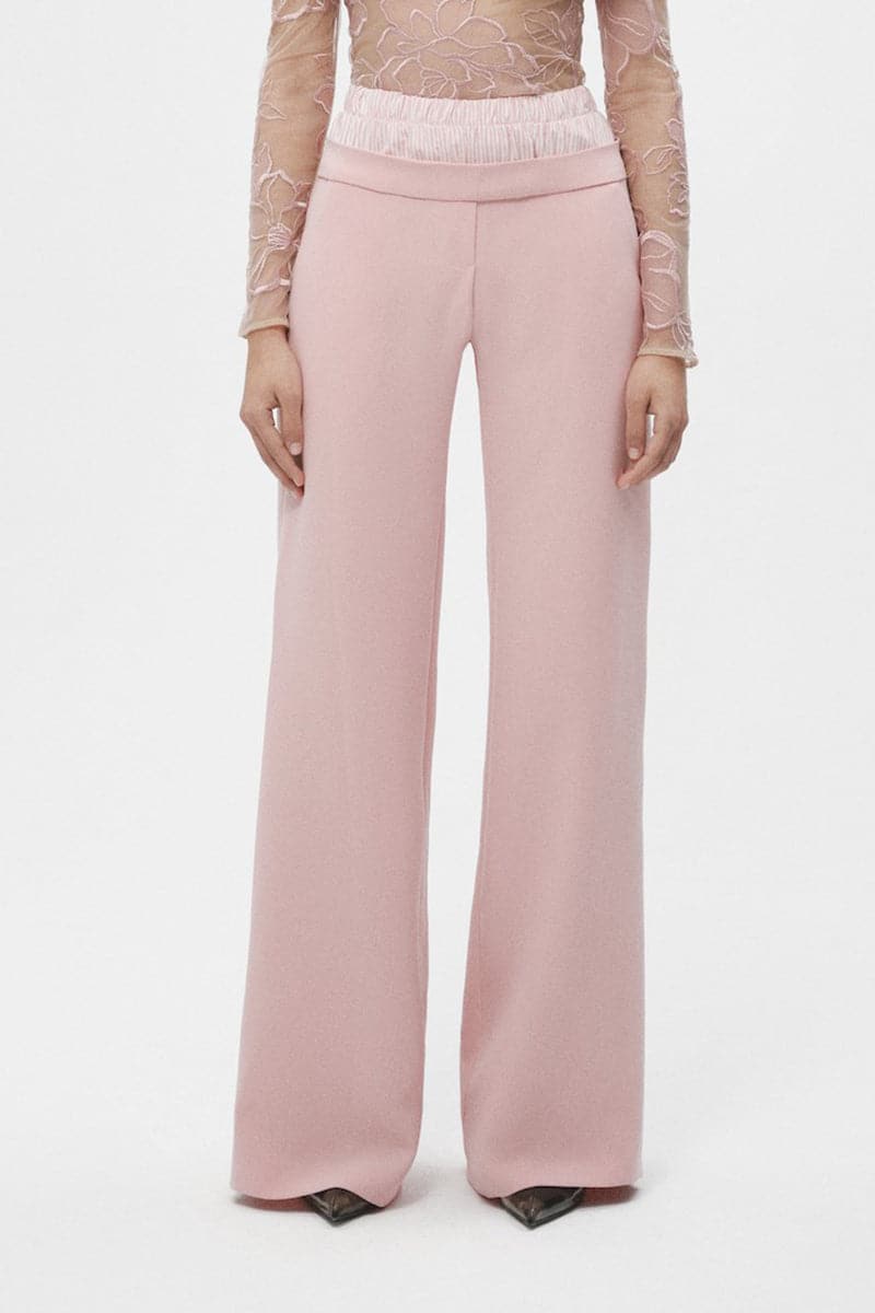 Pink JC Pajares double waistband pants with relaxed fit, shown on a model against a plain background.