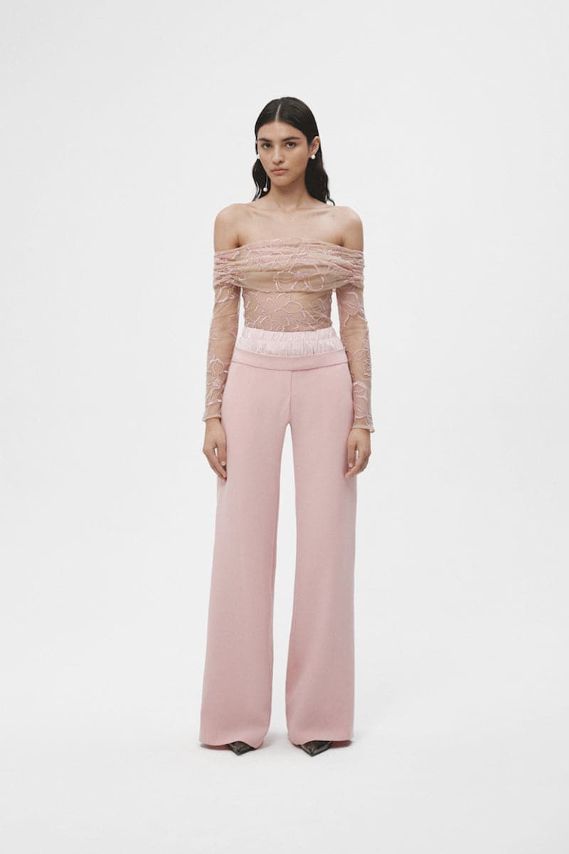 Pink double waistband pants by JC Pajares, showing front view with relaxed fit and stylish double waist detail.
