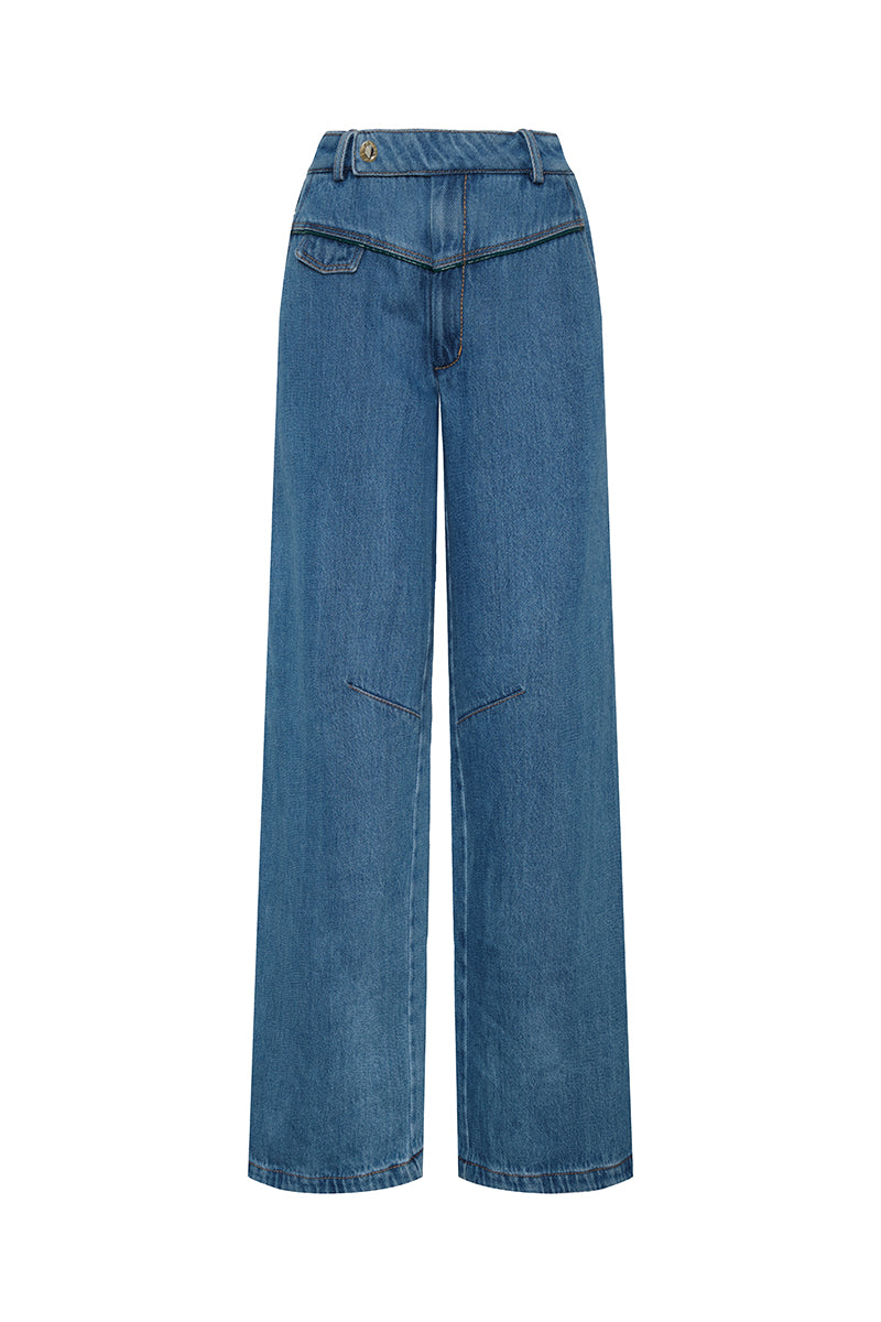 DUMA&CO HUELLA jeans with classic five-pocket design and slim fit, shown in dark denim with distressed details.