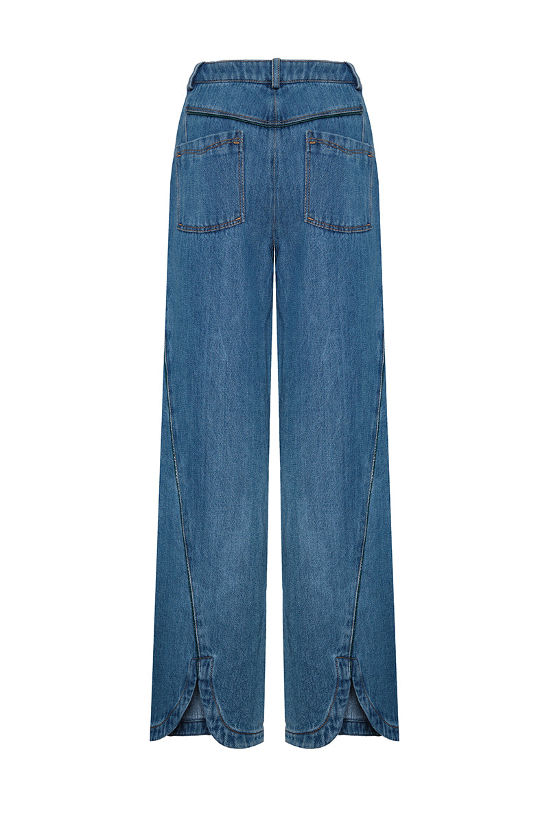 DUMA&CO HUELLA jeans pants with classic five-pocket design and medium wash denim, displayed on a neutral background.