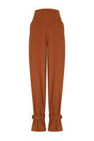DUMA&CO ETEREO pants in black fabric, slim fit design with front pockets, displayed on a hanger.