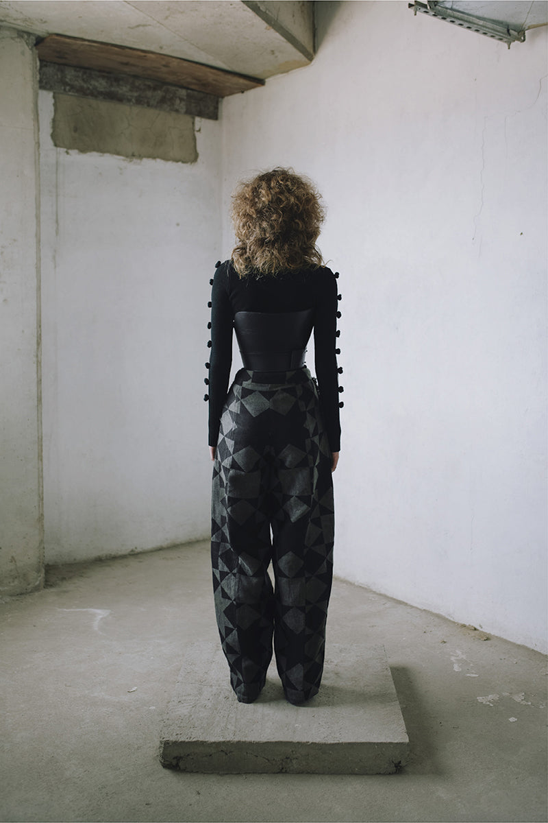 Pattern baggy trousers by MAZ Manuela Álvarez featuring a relaxed fit and bold geometric patterns on lightweight fabric.