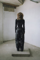 Pattern baggy trousers by MAZ Manuela Álvarez featuring a loose fit with a stylish pattern, shown in the product image.