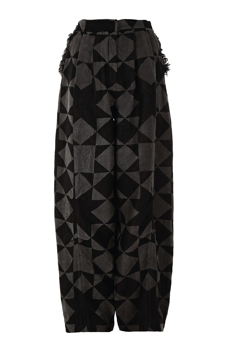 Pattern baggy trousers by MAZ Manuela Álvarez featuring a relaxed fit and stylish pattern, shown in a full-length view.