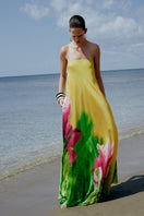 Sisters Peony Dress in bold blossom print, stylish maxi dress with vibrant floral pattern and flowing fabric.