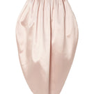 Pastel pink peony maxi skirt by Studio NK, flowing fabric with a floral-inspired design, perfect for elegant, feminine style.