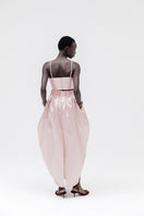 Pastel pink Peony Top by Studio NK, a stylish women's blouse with ruffled details and a relaxed fit.