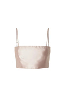 Studio NK Peony Top in pastel pink, a stylish women's blouse with a soft, flowy fabric and elegant design.