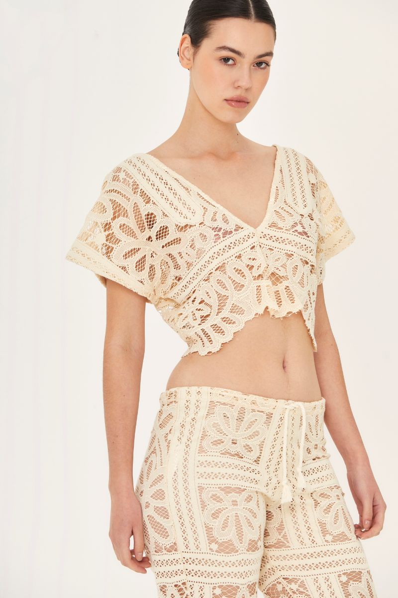 Aguaclara La Perle crop top in vibrant color, featuring a stylish design, perfect for casual or summer outfits.