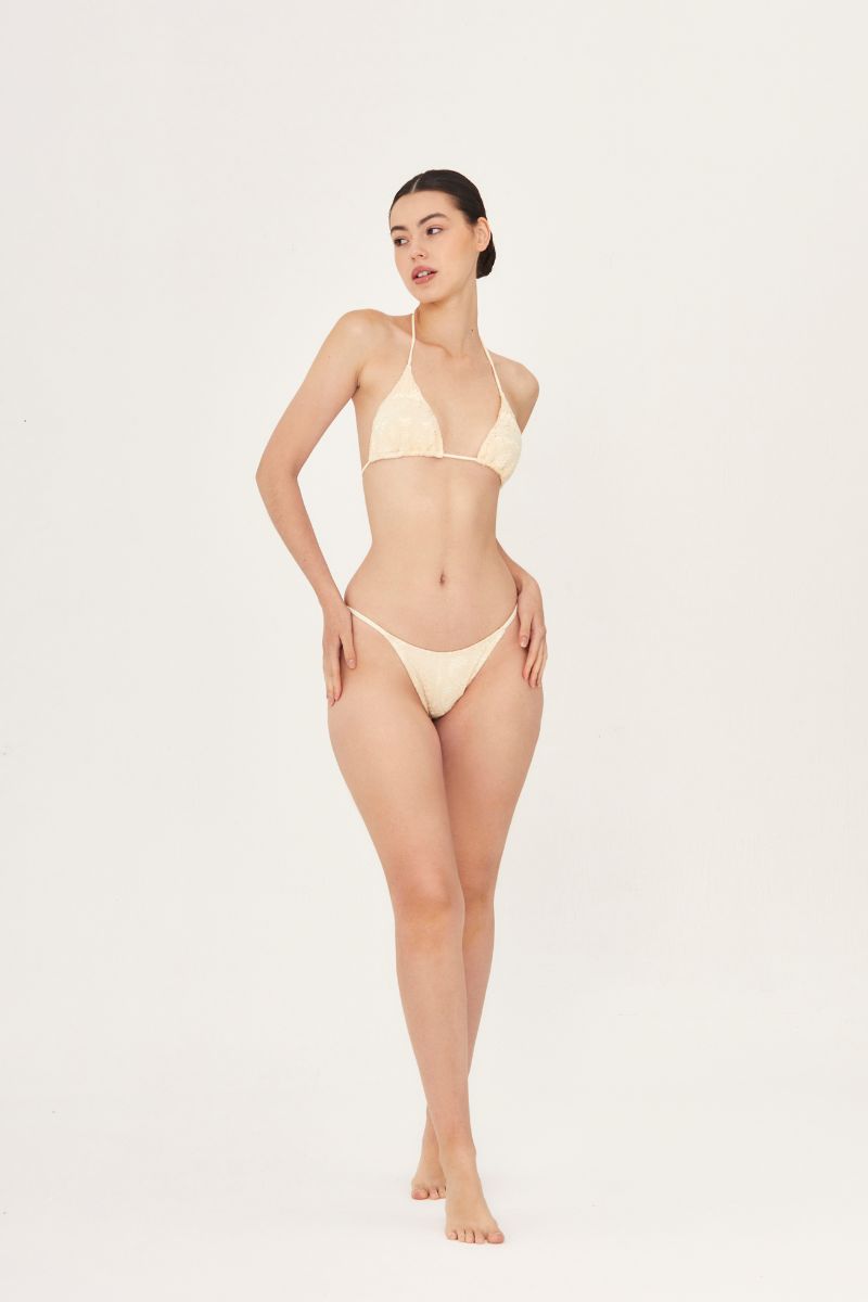 Aguaclara La Perle lace triangle bikini top with delicate lace details, adjustable straps, and a stylish fit for beach or pool wear.