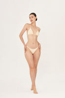 Aguaclara La Perle lace triangle bikini top in delicate lace fabric, featuring adjustable straps and classic triangle design.