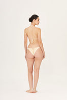 Aguaclara La Perle lace triangle bikini top with adjustable straps and delicate lace detailing, shown on a plain background.