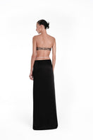 Nué YASMIN Maxi Skirt in flowing fabric, featuring a relaxed fit and vibrant pattern, perfect for casual or dressy occasions.